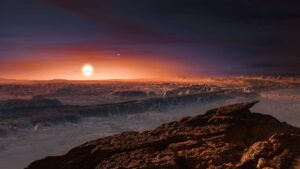 This artist’s impression shows a view of the surface of the planet Proxima b orbiting the red dwarf star Proxima Centauri, the closest star to the Solar System. The double star Alpha Centauri AB also appears in the image to the upper-right of Proxima itself. Proxima b is a little more massive than the Earth and orbits in the habitable zone around Proxima Centauri, where the temperature is suitable for liquid water to exist on its surface.