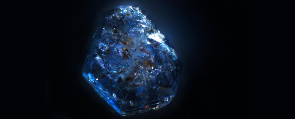 One of the sapphires, just 0.9 millimeters across, from the Volcanic Eifel. (Sebastian Schmidt) https://www.sciencealert.com/the-mysterious-origins-of-sapphires-have-finally-been-deciphered